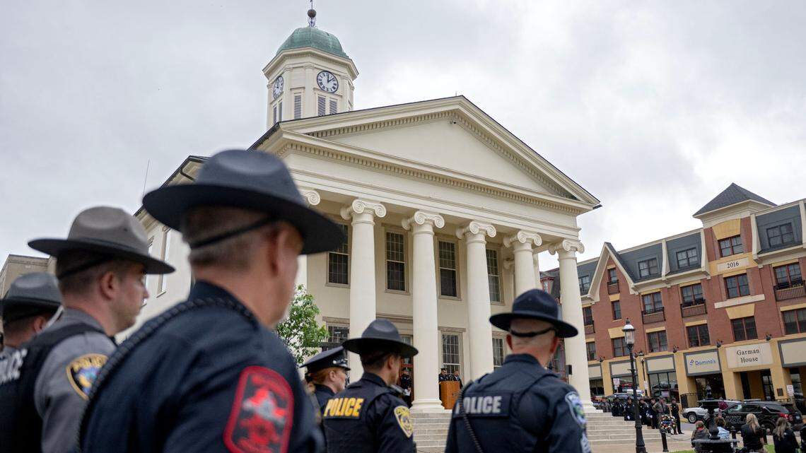 Local law enforcement listen to former State College police Chief John Gardner during the 2025 Centre County Peace Officers Memorial Ceremony on May 14, 2025 outside the Centre County Courthouse. The ceremony was part of National Police Week.