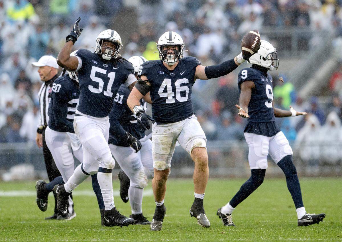 Penn State defensive ends Hakeem Beamon and Nick Tarburton celebrate during the game on Saturday, Oct. 1, 2022.