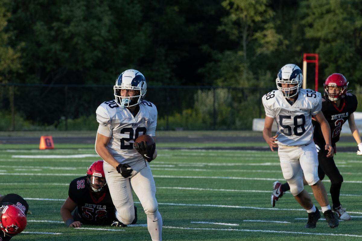 Penns Valley wide receiver Fletcher Ironside (20) runs with the ball at Central Cambria High School in Ebensburg, Pa., on Friday, Aug. 29, 2025. The Red Devils beat the Rams 16-14.