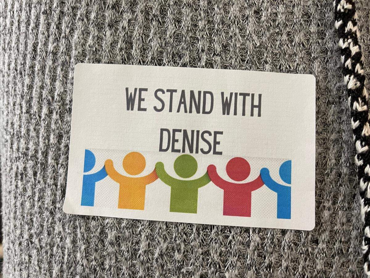 Some Halfmoon township residents wore “We stand with Denise” stickers to Thursday’s board of supervisors meeting, where the possibility of firing the manager, Denise Gembusia, was on the table.