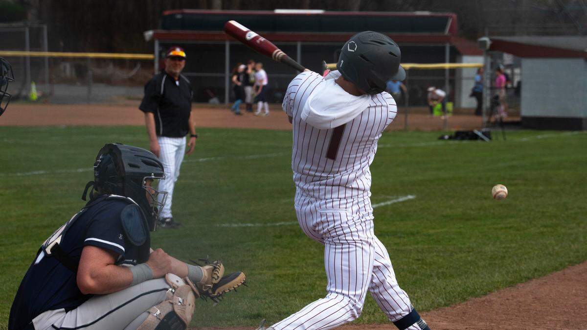 State College’s Jake Hall hits the ball during a baseball game against Chambersburg in State College, Pa., on Tuesday, March 31, 2026.