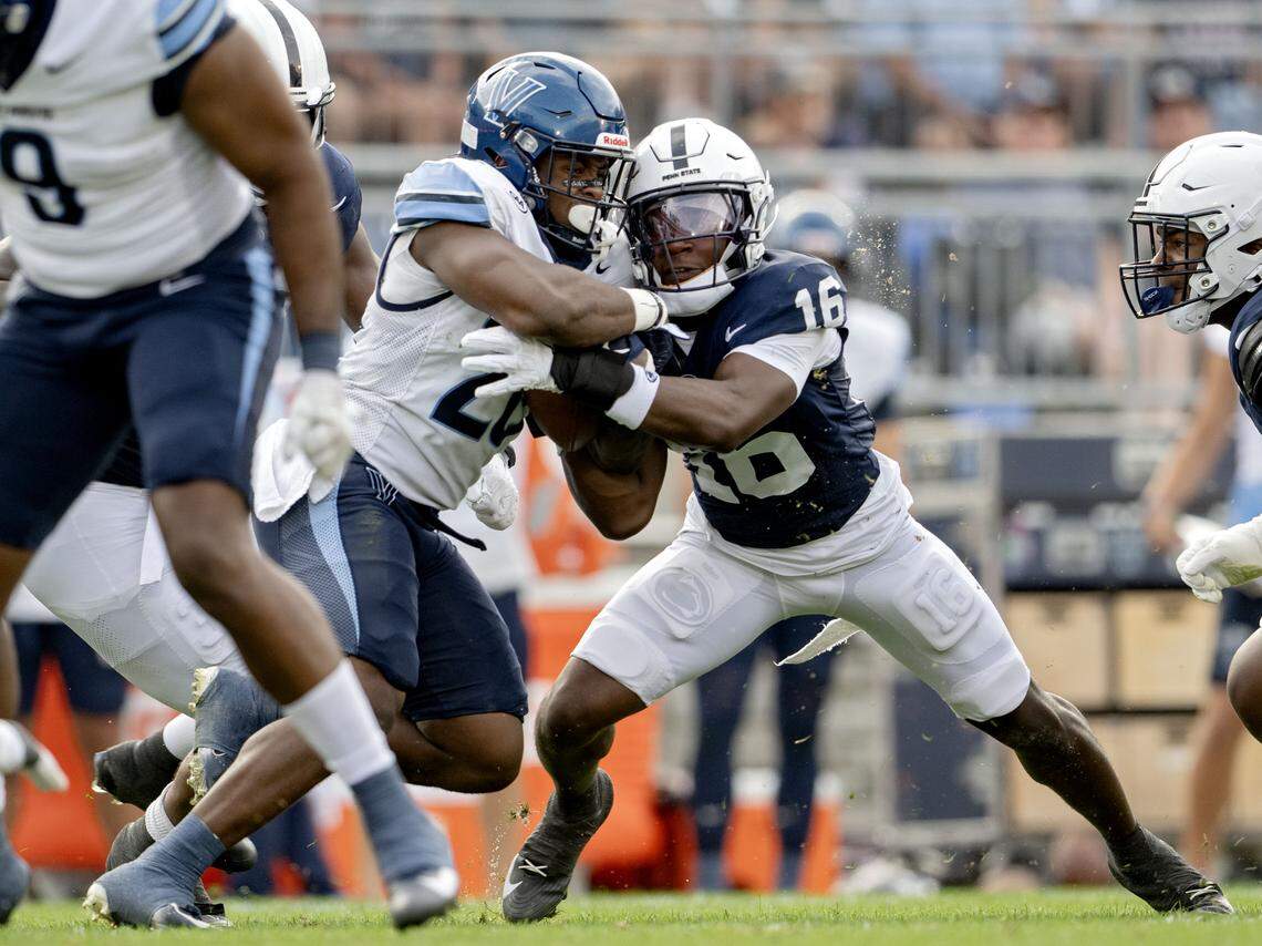 Penn State safety King Mack stops Villanova running back Isaiah Ragland during the game on Saturday, Sept. 13, 2025.