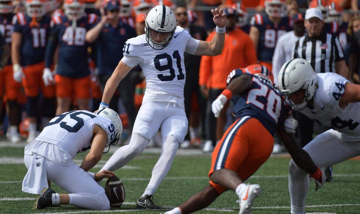Sep 16, 2023; Champaign, Illinois, USA;  Penn State Nittany Lions kicker Alex Felkins (91) kicks a field goal against the Illinois Fighting Illini during the first half at Memorial Stadium. Mandatory Credit: Ron Johnson-USA TODAY Sports