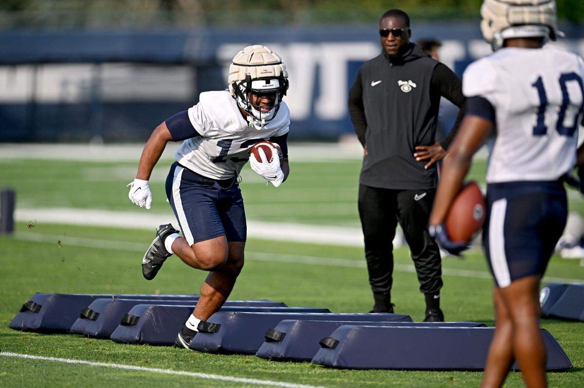 Penn State running back Kaytron Allen runs a drill at practice on Wednesday, July 31, 2024.