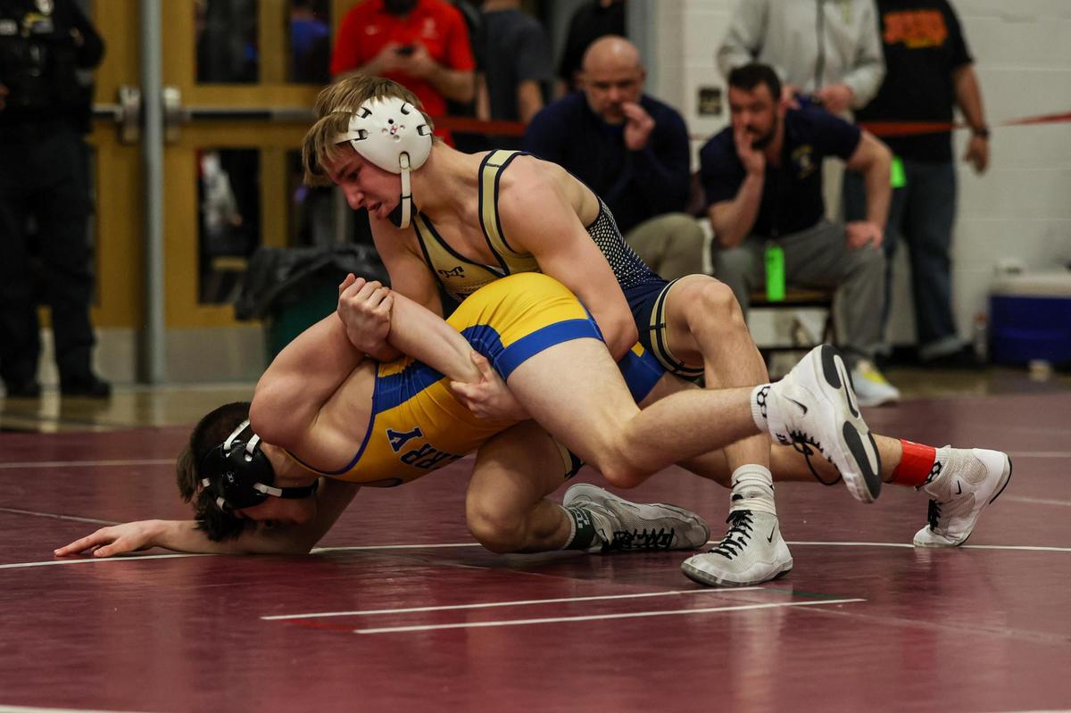 Bald Eagle Area’s Tanner Guenot looks for a tilt on Derry’s Dylan Bateman in their 121-pound quarterfinals match of the PIAA Class 2A Southwest Regional on Friday in Altoona. Guenot beat Batement, 4-1.