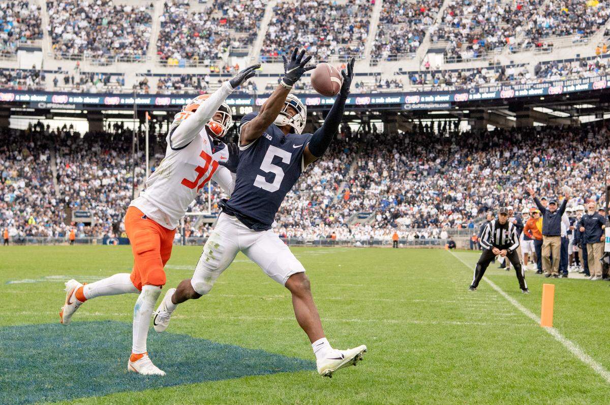 Illinois defensive back Devon Witherspoon covers as Penn State wide receiver Jahan Dotson misses a catch in the end zone during the first overtime of the game on Saturday, Oct. 23, 2021.