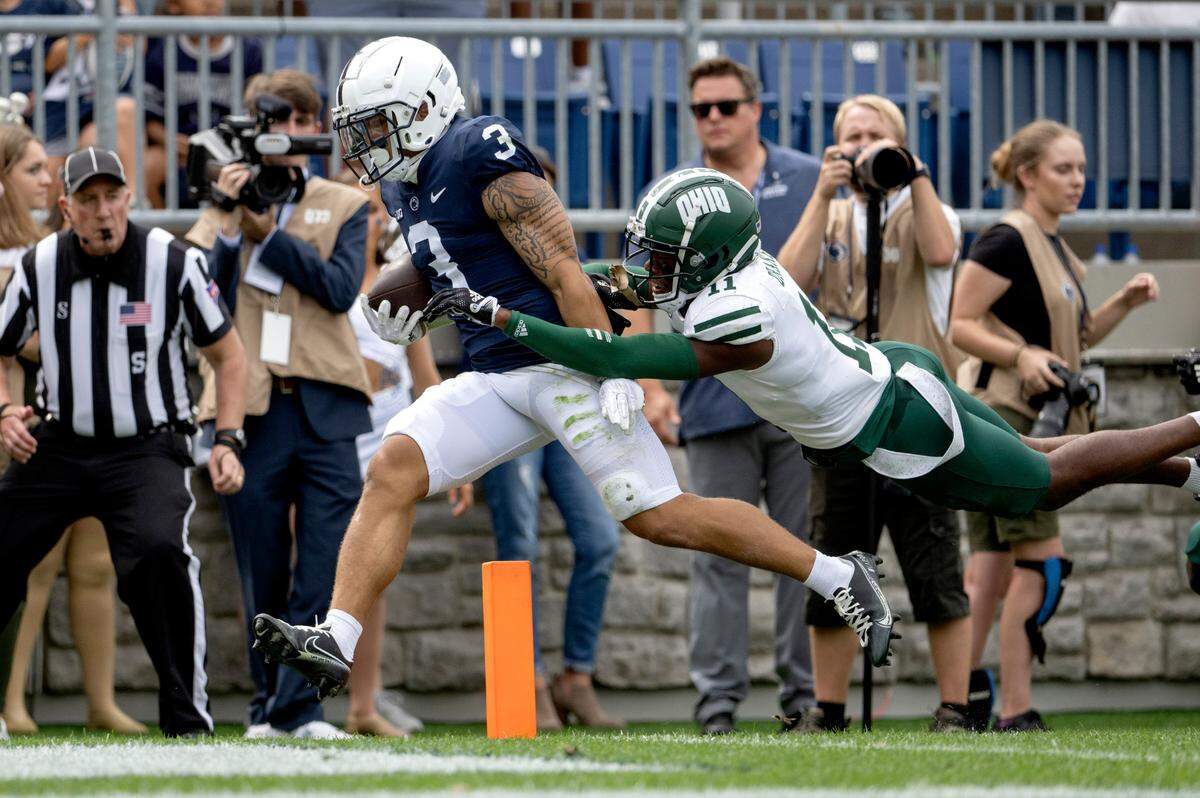 Ohio’s Tariq Drake reaches for Penn State wide receiver Parker Washington during the game on Saturday, Sept. 10, 2022. Washington’s touchdown was called back for stepping out of bounds.