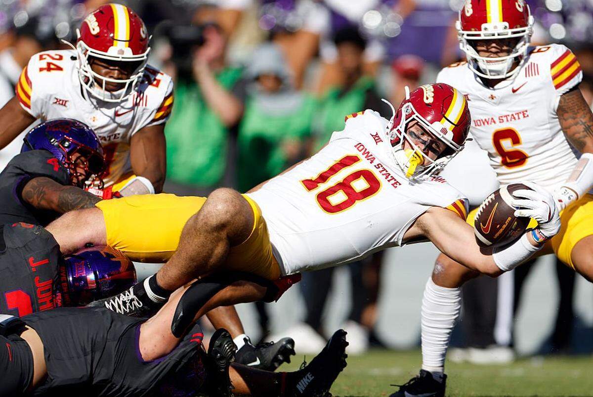FORT WORTH, TEXAS - NOVEMBER 8: Benjamin Brahmer #18 of the Iowa State Cyclones reaches across the goal line to score a touchdown against the TCU Horned Frogs during the first half at Amon G. Carter Stadium on November 8, 2025 in Fort Worth, Texas. (Photo by Ron Jenkins/Getty Images)