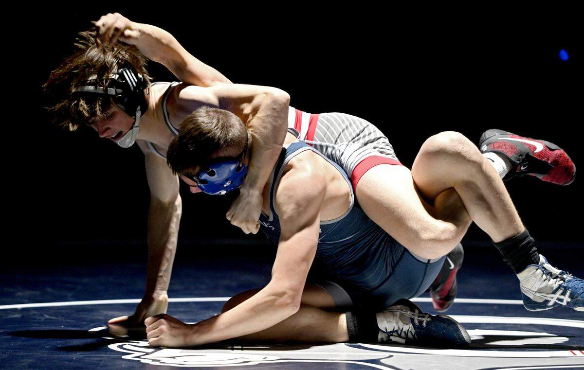 Bellefonte’s Cameron Garcia and Penns Valley’s Sawyer Fetterfolf in the 145 lb bout of the wrestling match on Thursday, Jan. 16, 2025. Garcia won by decision, 12-5.