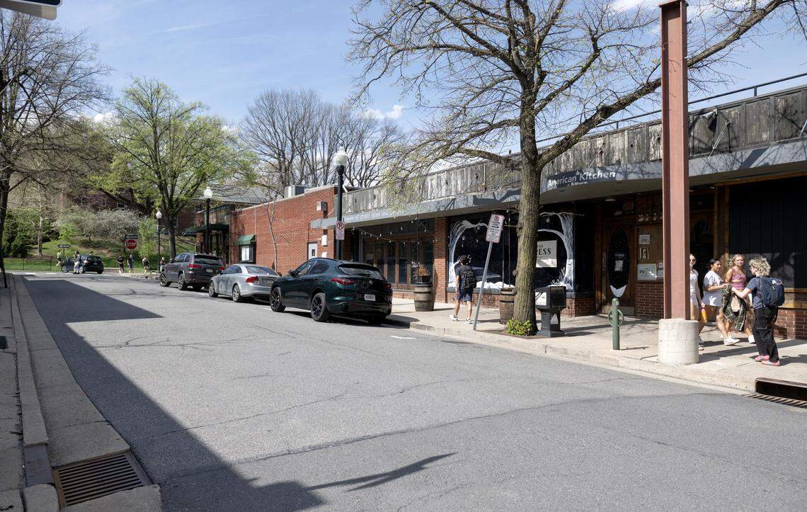 People walk along Hiester Street past The Press on Thursday, April 16, 2026. The Downtown State College Improvement District will close the street and create “East End Social” for the summer.