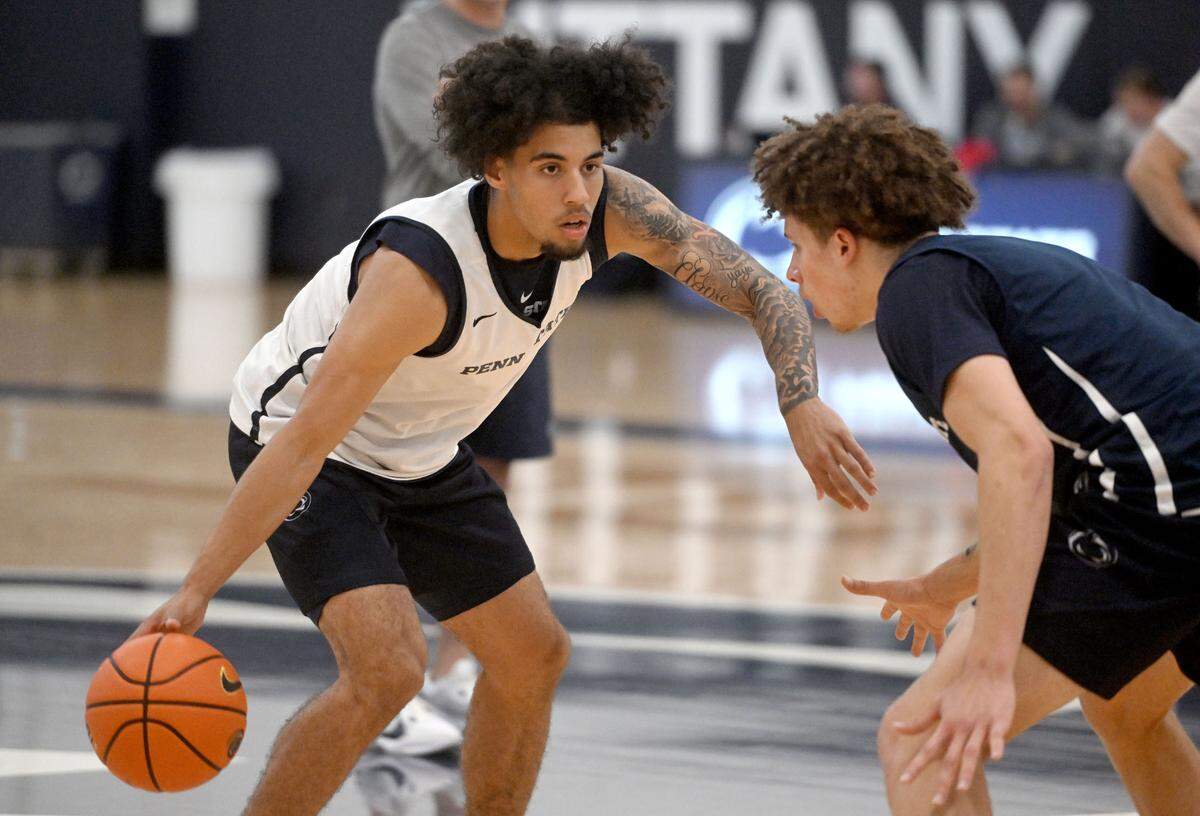 Penn State’s Jahvin Carter cuts around a defender during summer practice on Thursday, July 18, 2024.