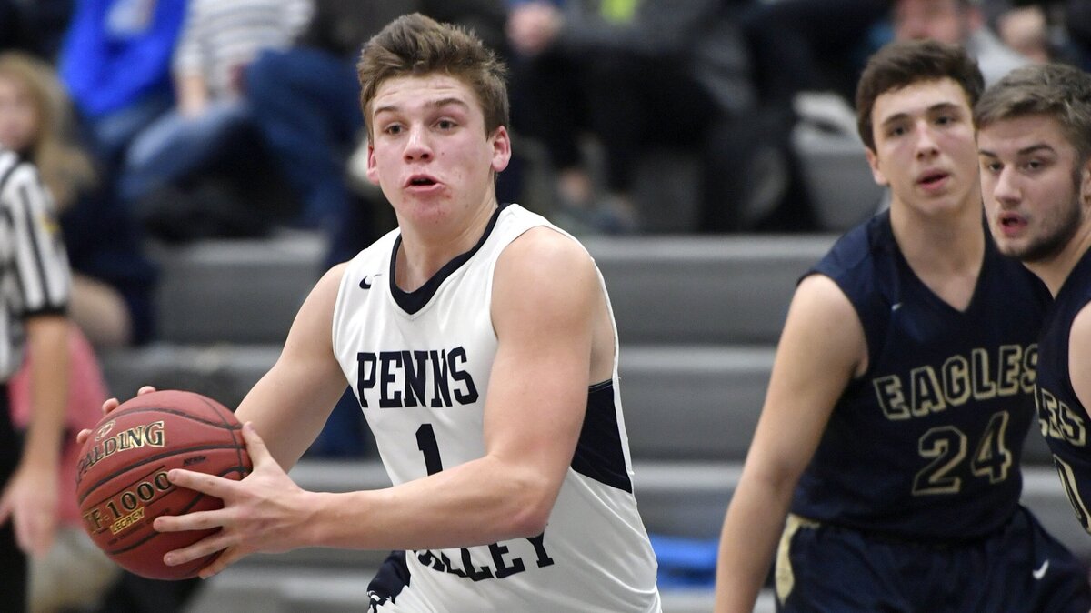 Penns Valley’s Logan Snyder dribbles towards the net from Bald Eagle Area defenders during the game on Tuesday, Dec. 18, 2018.