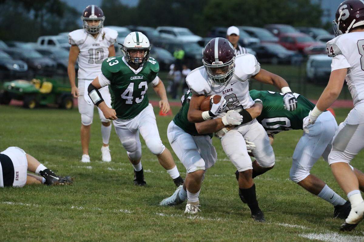 State College’s Dresyn Green runs down the field against Carlisle on Sept. 13.