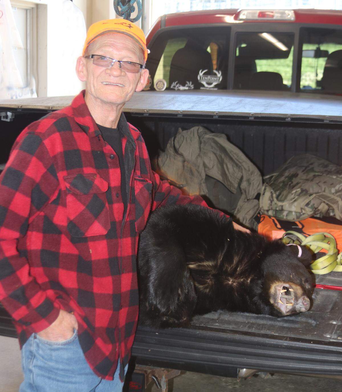 Buddy Dorman poses with the bear that he checked at the Centre County check station.