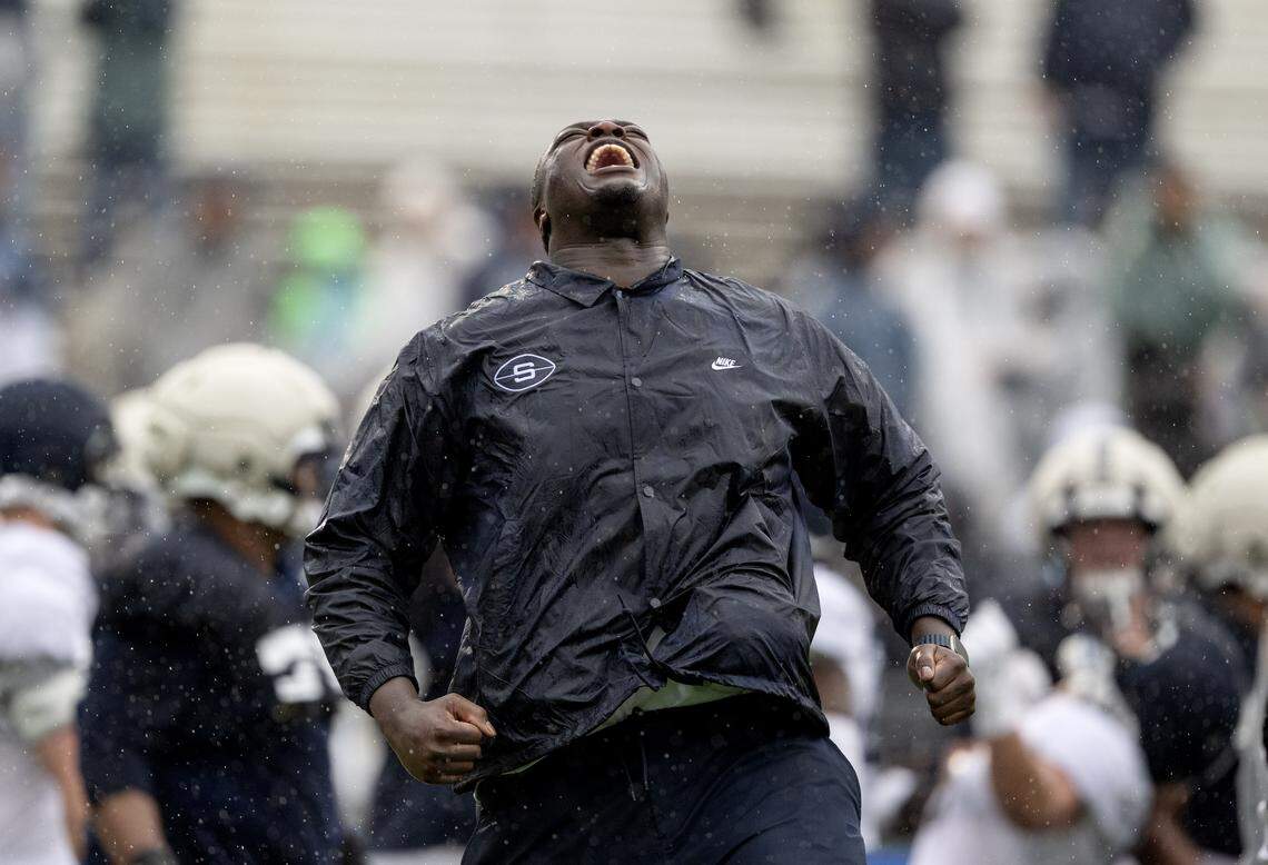 Penn State offensive lineman Anthony Donkoh reacts in excitement as it is announced that his former teammate Drew Shelton was drafted into the NFL during the Blue-White Practice on Saturday, April 25, 2026.  