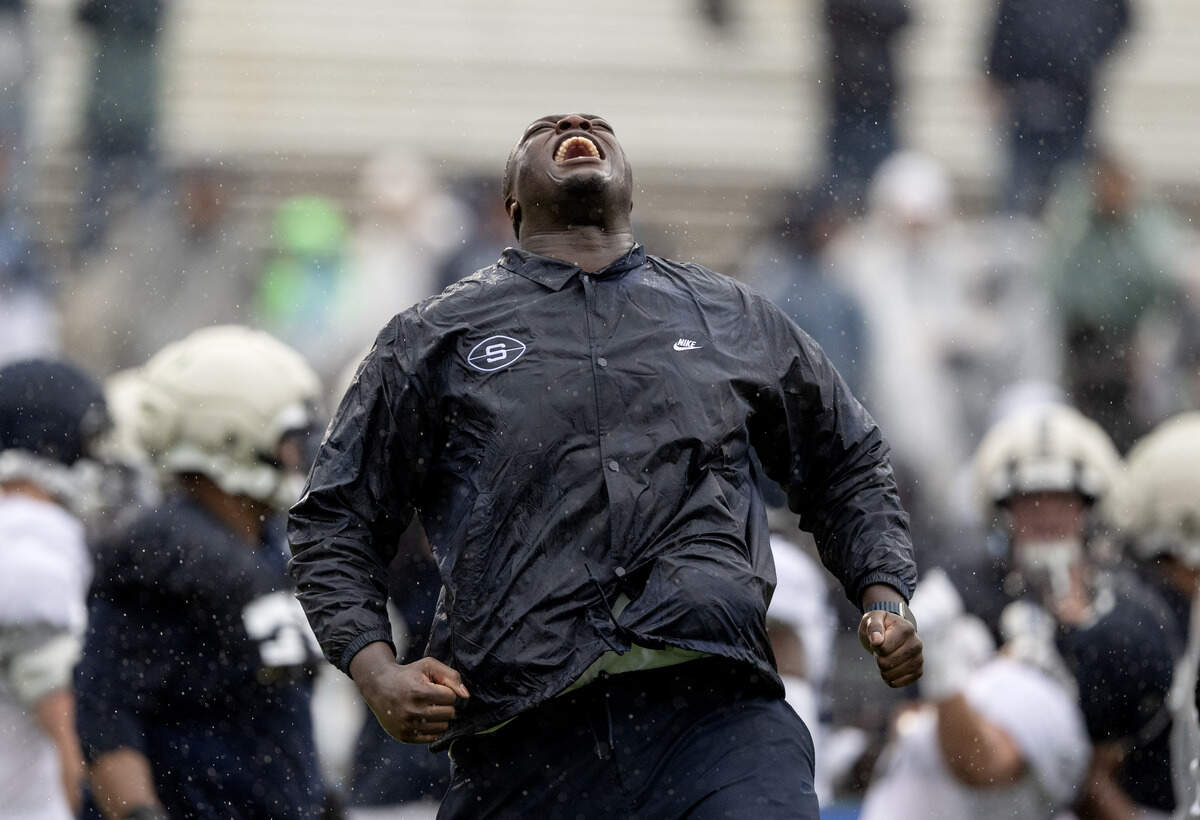 Penn State offensive lineman Anthony Donkoh reacts in excitement as it is announced that his former teammate Drew Shelton was drafted into the NFL during the Blue-White Practice on Saturday, April 25, 2026.
