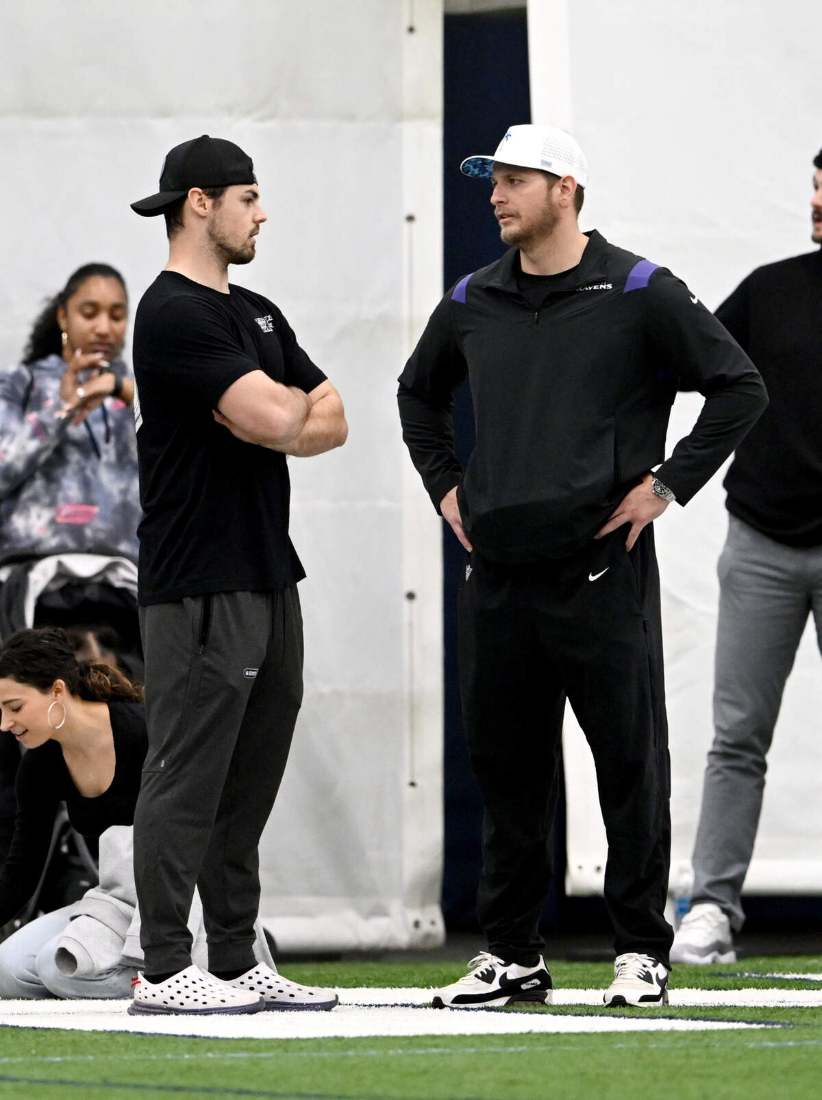 Former Penn State quarterback and current NFL free agent Trace McSorley talks to scouts during Penn State’s Pro Day on Friday, March 15, 2024 in Holuba Hall.