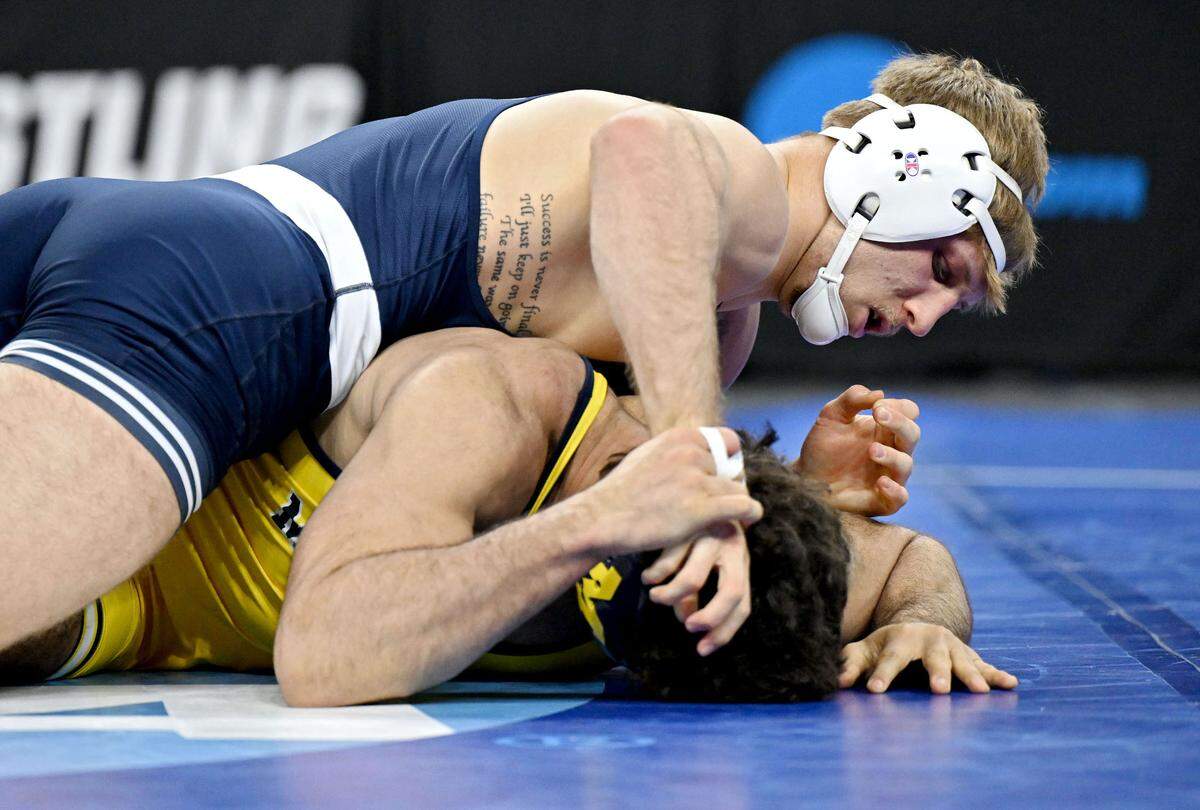 Penn State’s Josh Barr controls Michigan’s Jacob Cardenas in a 197-pound semifinal bout at the 2025 NCAA Wrestling Championships in Philadelphia on Friday, March 21, 2025.