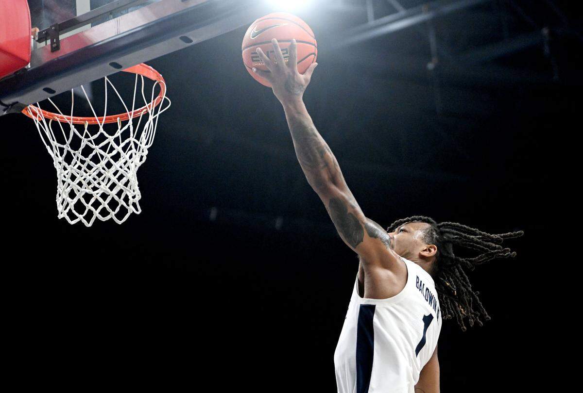 Penn State’s Ace Baldwin Jr. goes in for a basket during the game against Purdue on Thursday, Dec. 5, 2024.