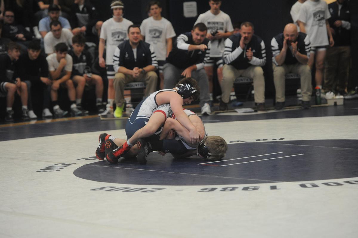 Philipsburg-Osceola’s Ace Foster looks for a takedown on Bellefonte’s Wyatt Long in their 114 pound match of the Mounties’ 37-22 loss on Saturday, January 7, 2023 in the Mountaineer Duals at Philipsburg. Foster snuck by Long, 3-2.
