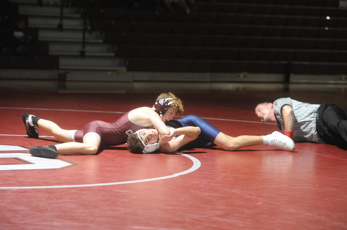 State College’s Nicholas Berrena looks for the fall of Shikellamy’s Jewllius Morales in their 114-pound match of the Little Lions’ 36-35 loss on Wednesday, Dec. 7, 2022. Berrena pinned Morales in 1:41.