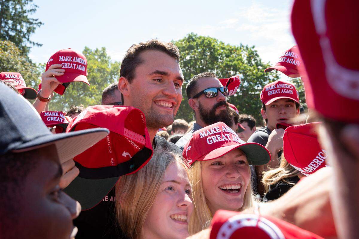 Charlie Kirk poses for a photo with fans during the Turning Point “You’re Being Brainwashed Tour” on Thursday, Sept. 19, 2024.