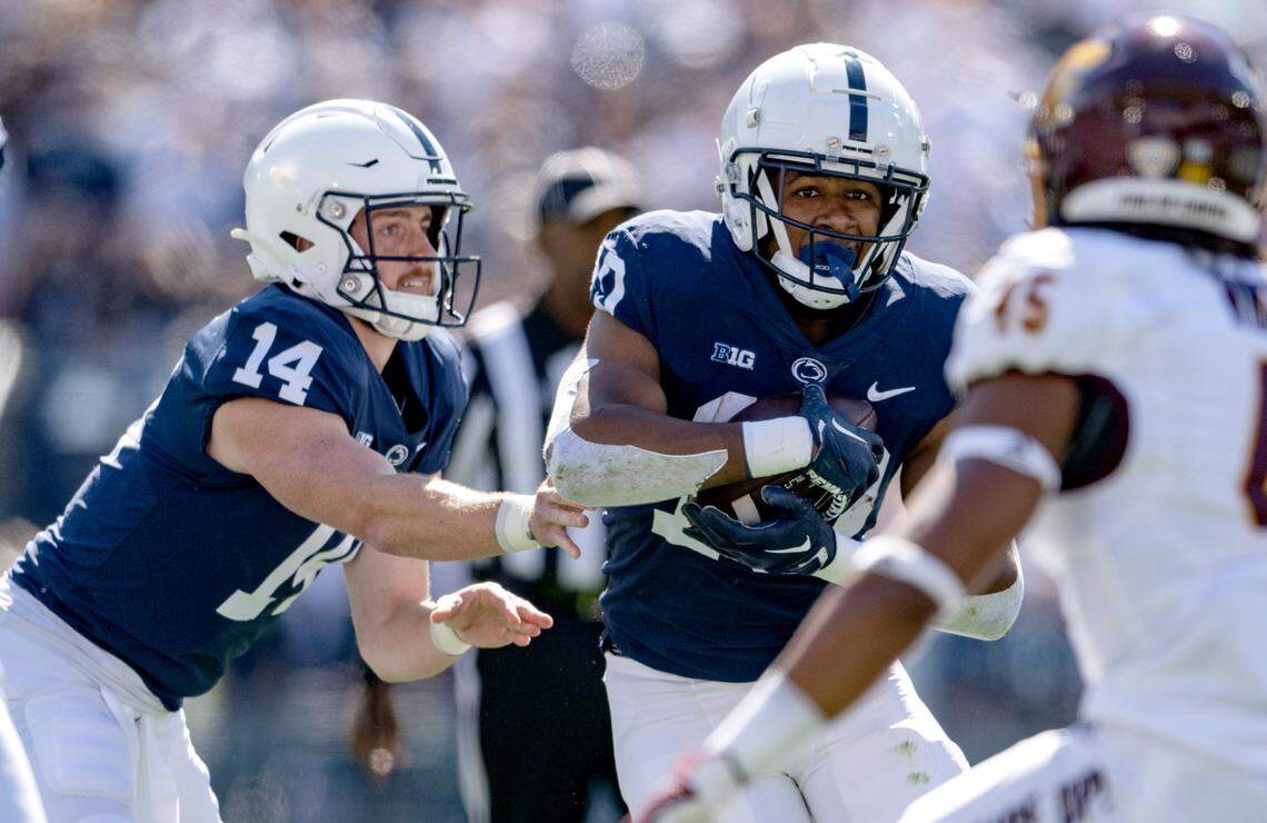 Penn State running back Nicholas Singleton gets the hand off from quarterback Sean Clifford during the game against Central Michigan on Saturday, Sept. 24, 2022.