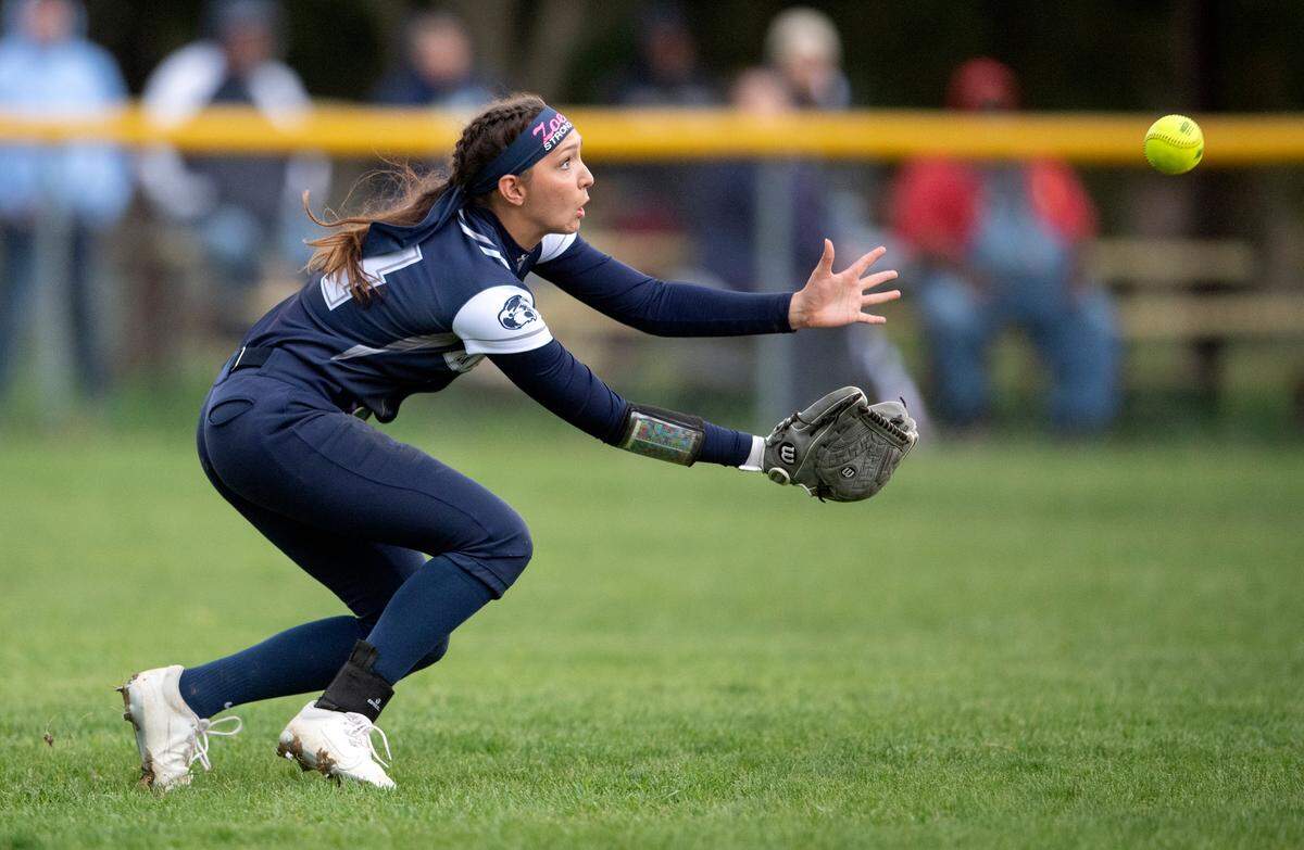 Philipsburg-Osceola’s Paige Jarrett makes a diving catch during the softball game against Bald Eagle Area on Tuesday, April 26, 2022.