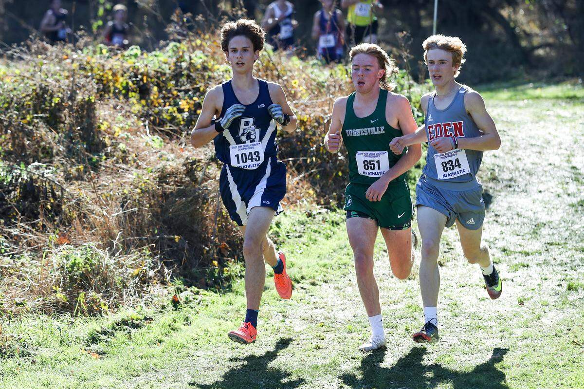 Philipsburg‐Osceola’s Chad Muckey, left, competes in the boys 1A race of the PIAA State Cross Country Championships held Saturday at Parkland Cross Country Course in Hershey, PA.Matthew O’Haren/For the Centre Daily Times