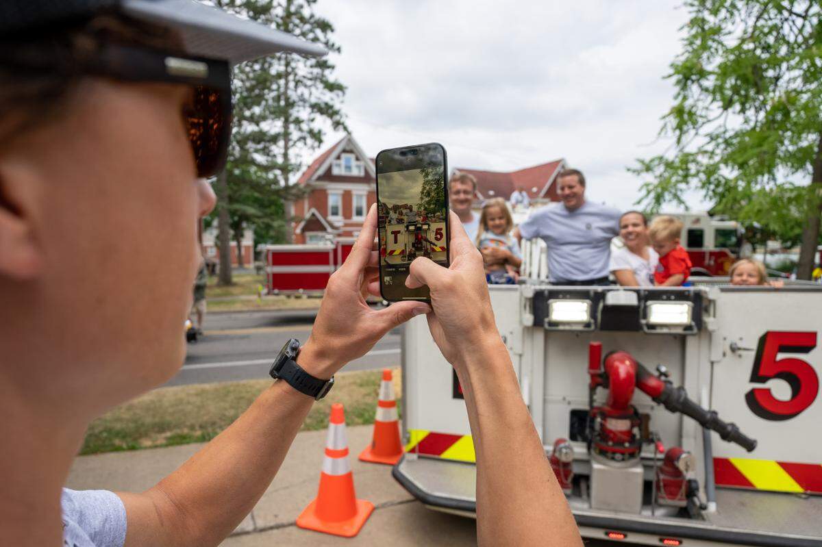 Fire truck bucket rides were part of Alpha Fire Company’s 125th anniversary celebration.