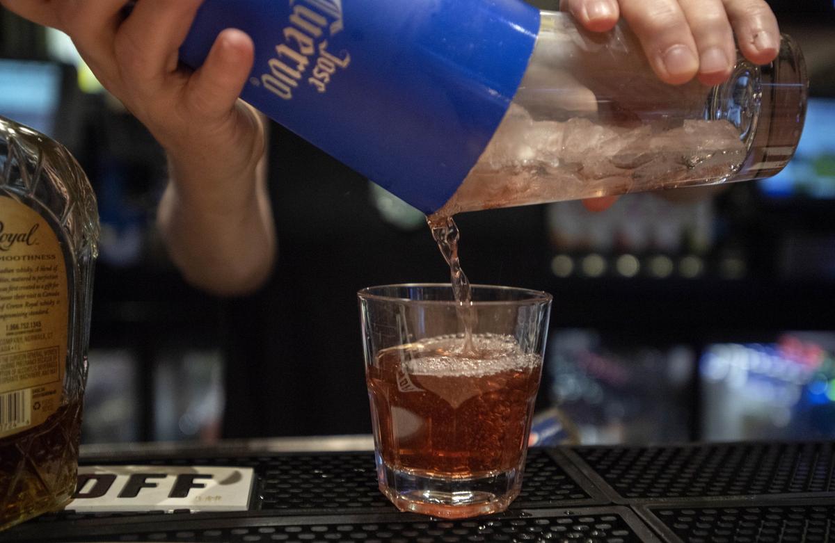 A bartender pours a Royal Flush on Tuesday, July 10, 2018, at Bill Pickle's Taproom in downtown State College.