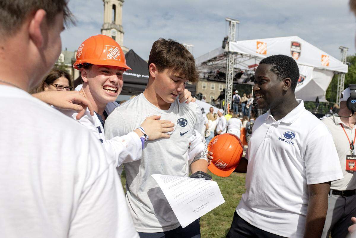 Penn State student Carson Albright is congratulated by friends after kicking a 33-yard field goal on ESPN’s College GameDay on Saturday, Sept. 27, 2025.  