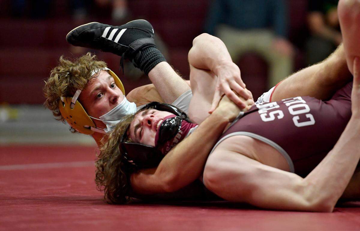 Bellefonte’s Ethan Richner controls State College’s Braden Newby in the 160 lb bout of the District 6 3A team championships on Thursday, March 18, 202.