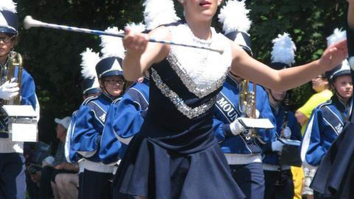 Samantha Bainey twirled with the P-O marching band in Saturday’s Hetitage Days parade.
