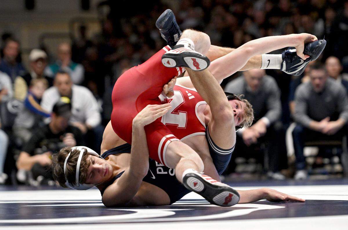 Penn State’s Baylor Shunk wrestles Nebraska’s Jacob Van Dee in the 133 lb bout of the match on Sunday, Feb. 18, 2024 in Rec Hall.