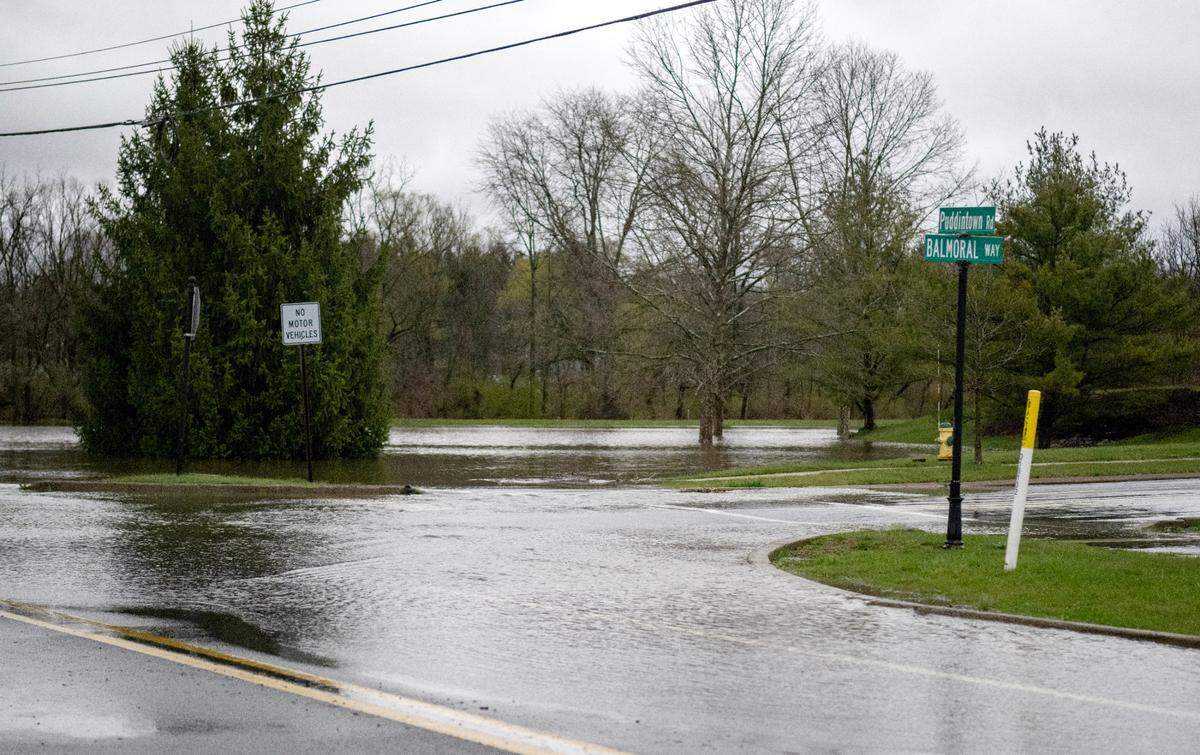 Water at the intersection lion of Puddintown Road and Balmoral Way on Wednesday, April 3, 2024.