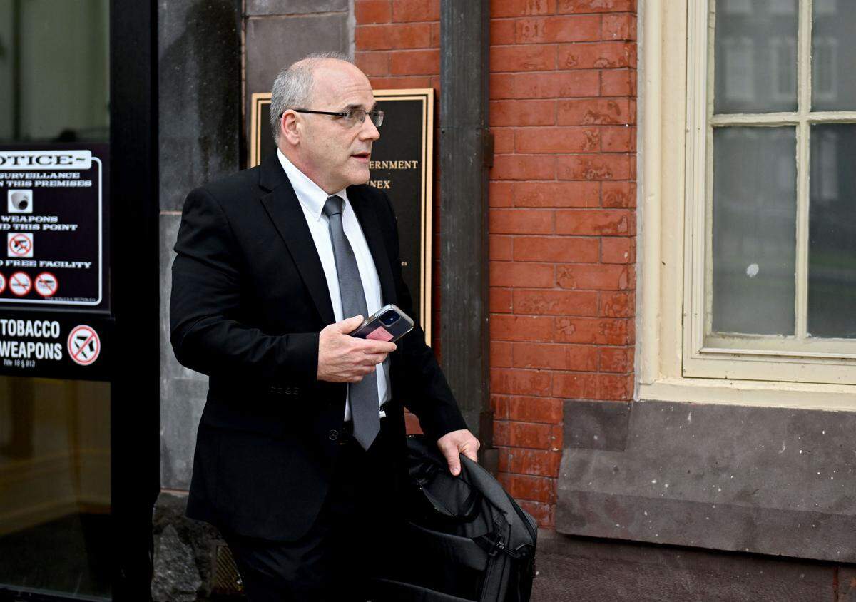 Penn State trustee Barry Fenchak leaves the Centre County Courthouse Annex on April 11, 2025.