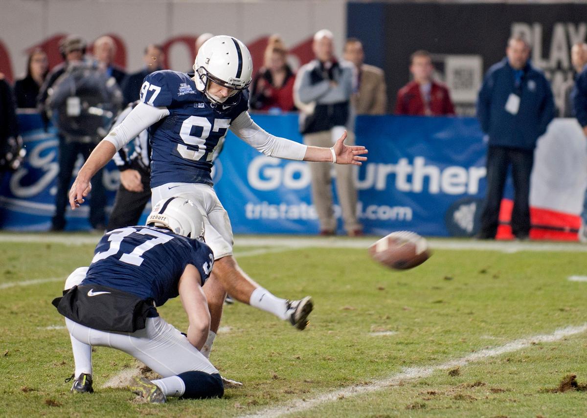 Penn State’s Sam Ficken kicks the winning field goal in overtime during the Saturday, December 27, 2014 Pinstripe Bowl game against Boston College at Yankee Stadium.  The Nittany Lions won in overtime, 31-30.  