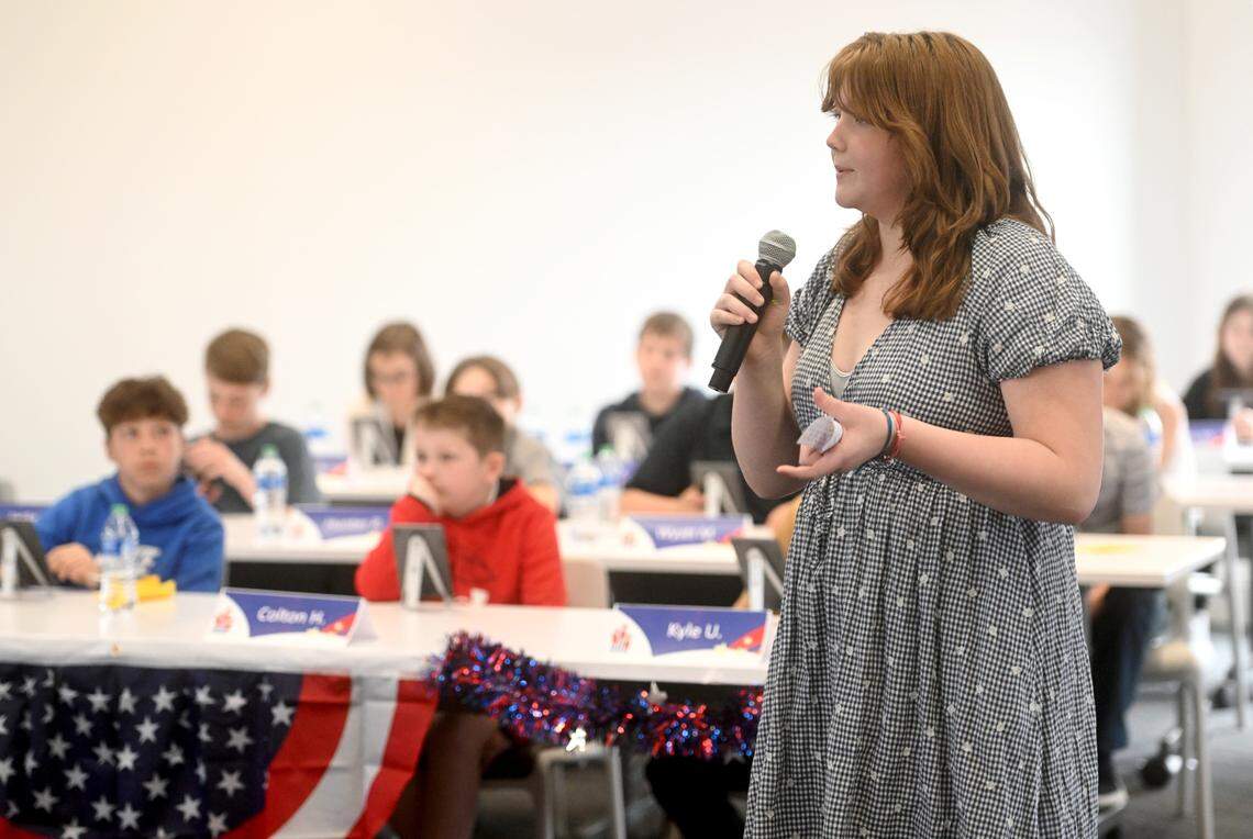 Mount Nittany Middle School eighth grader Katie Tyworth answers questions from the judges during the final round of the Centre County National Civics Bee on Monday at the Eric J. Barron Innovation Hub.