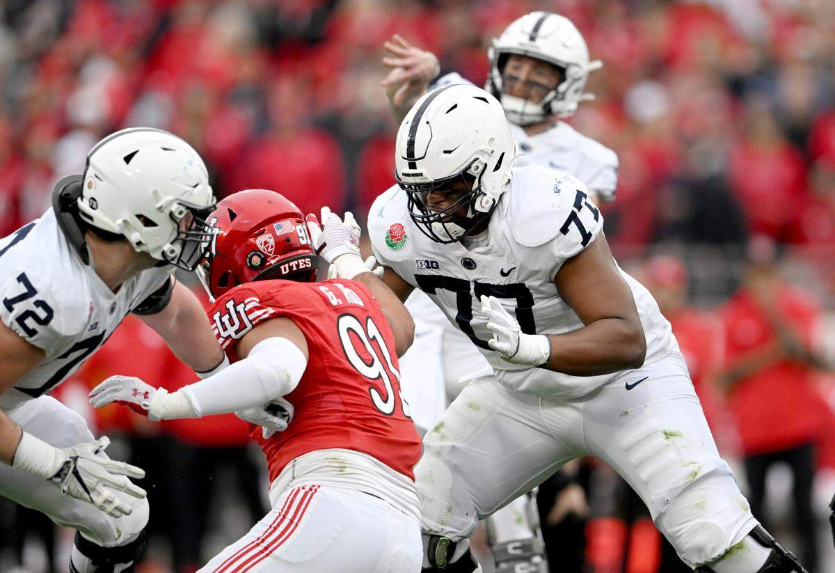Penn State offensive lineman Sal Wormley blocks Utah’s Gabe Reid as quarterback Sean Clifford makes a pass during the Rose Bowl game on Monday, Jan. 2, 2023.