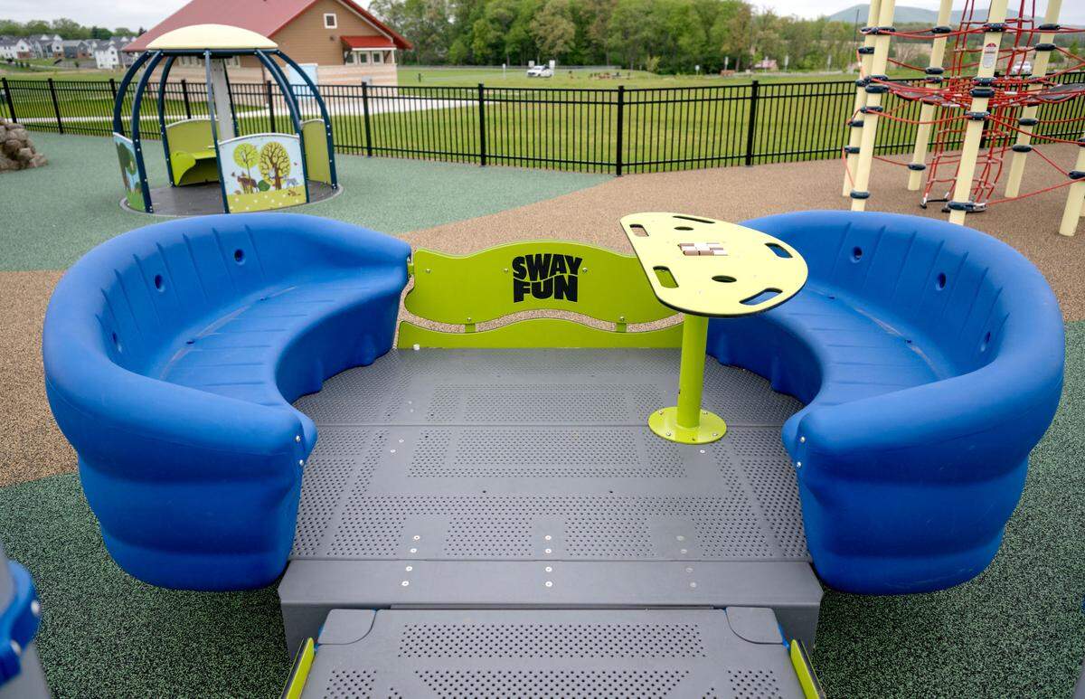 A sway fun glider at the all-abilities playground at Whitehall Road Regional Park on Tuesday, May 7, 2024.