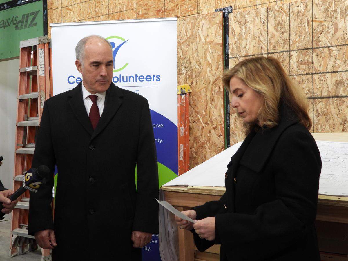 Pennsylvania Senator Bob Casey hears from Heddy Kervandjian, chair of the Centre Volunteers in Medicine board, after a tour of the new building Tuesday. Casey secured $1.1 million in federal funding for the nonprofit.