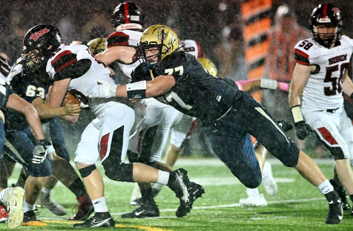 Bald Eagle Area’s Eric Clark stops Clearfield’s Carter Chamberlain during the game on Friday, Oct. 6, 2023.