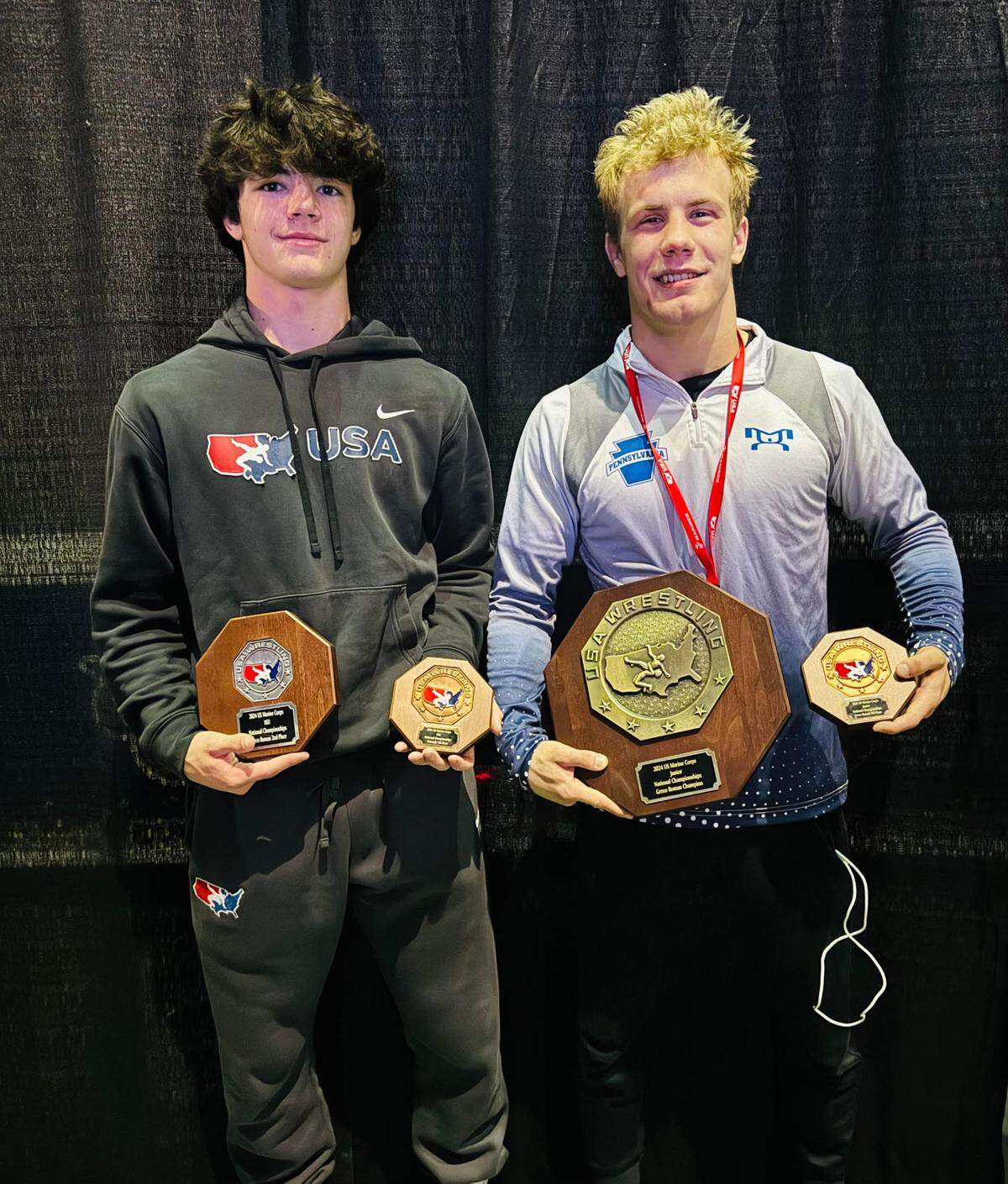 State College’s James Whitbred (left) and Pierson Manville each came away with two medals from the USMC/USAW Junior National Championships in Fargo, N.D. Manville won the 144-pound title in the Junior Men Division of Greco-Roman wrestling.