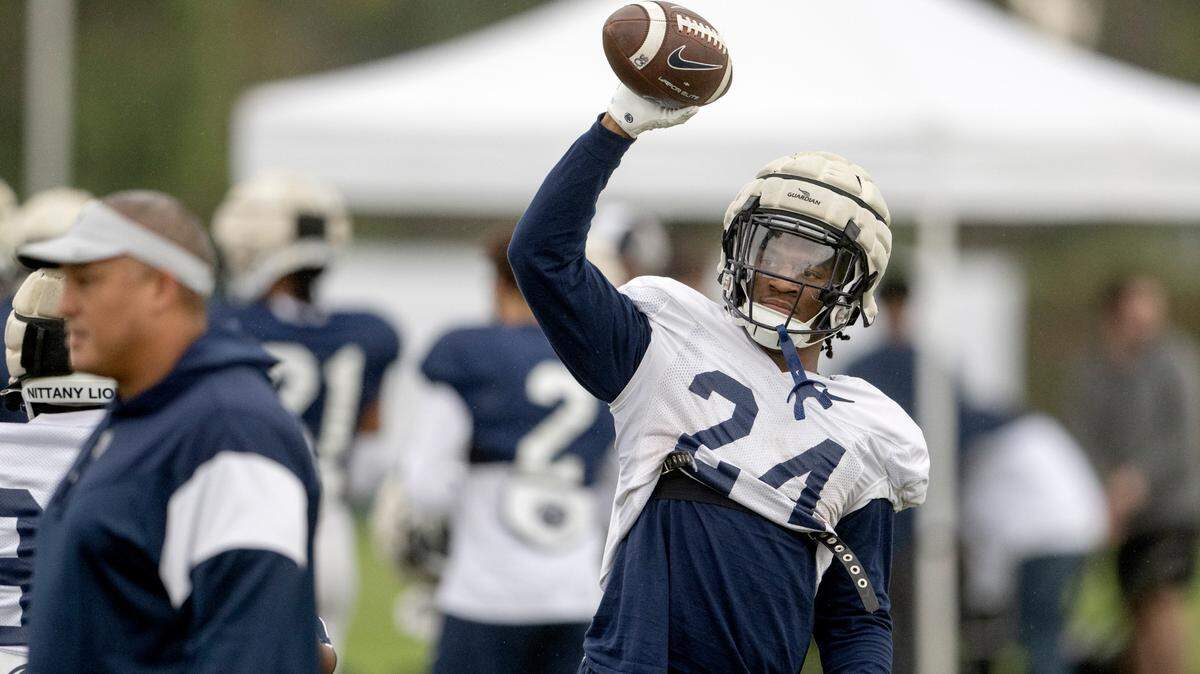 Penn State running back Keyvone Lee tosses the ball to a teammate to run a drill during practice for the Rose Bowl on Friday, Dec. 30, 2022 at Dignity Health Sports Park.