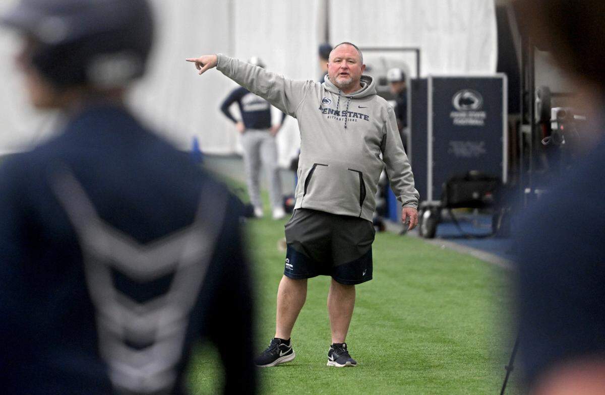 Penn State baseball coach Rob Cooper talks to his players during practice on Thursday, Feb. 9, 2023 in Holuba Hall.