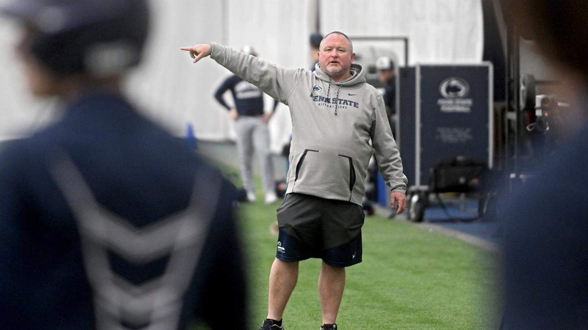 Penn State baseball coach Rob Cooper talks to his players during practice on Thursday, Feb. 9, 2023 in Holuba Hall.