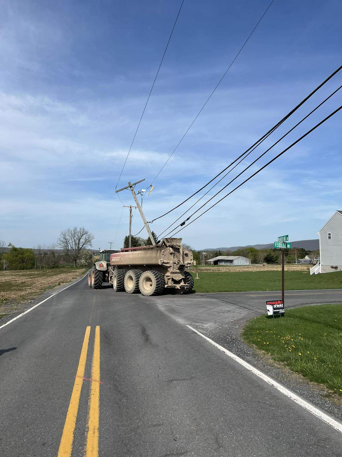 A portion of Weaver Hill Road was closed Thursday in Spring Township after a farm vehicle sheared off a utility pole, township police wrote in a Facebook post.