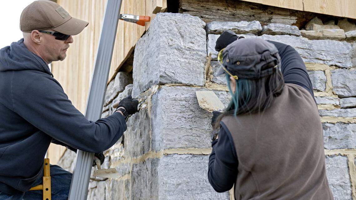 Nathan and Maria Day of Sterling Stoneworks & Restoration repoint the foundation of the barn on Gene and Rebecca Lengerich’s property on Wednesday, April 22, 2026.