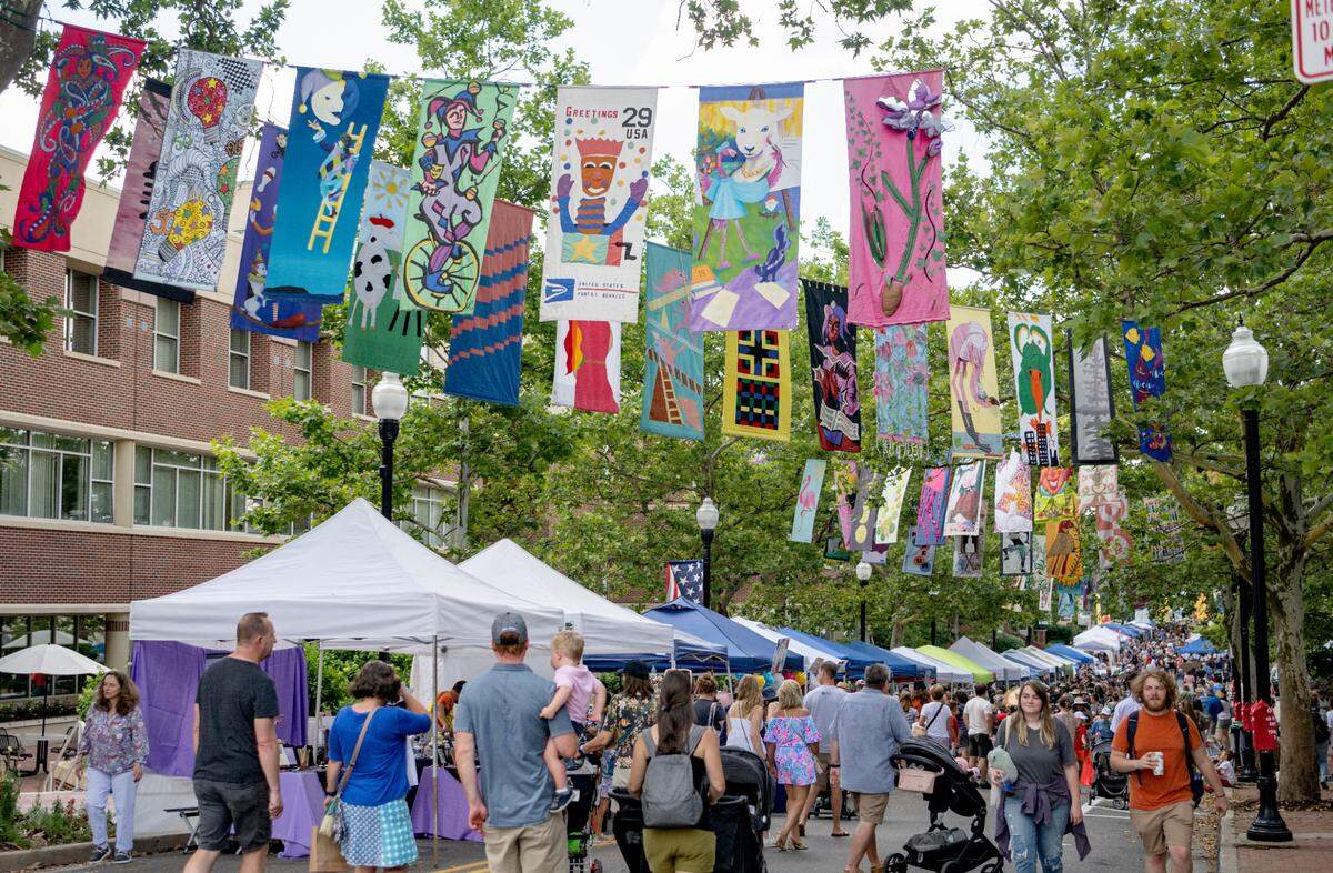 People fill Allen Street for Children and Youth Day at the Central Pennsylvania Festival of the Arts on Wednesday, July 13, 2022.